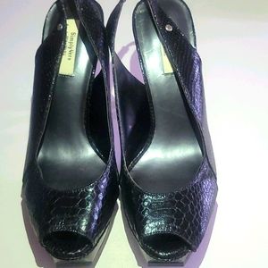 Black open top and sling back